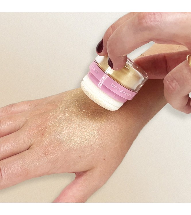 Polvos dorados brillantes de maquillaje